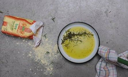 Ruby bakes rosemary…  cook the olive oil, garlic and the leaves from two rosemary sprigs 