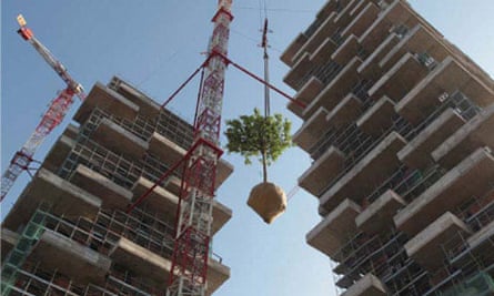 Trees being installed onto the Bosco Verticale skyscraper in Milan