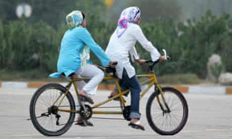 Two women cycling