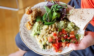 The Veggie Runners mother Dr Jayne Rodgers and her daughter Bibi Rodgers have brunch with friends at Jayne’s appartment after the Leeds 10K run.