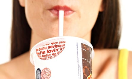 Woman drinking a McDonald's milkshake