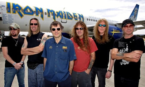 Iron Maiden in front of Ed Force One, their Boeing 747-700.