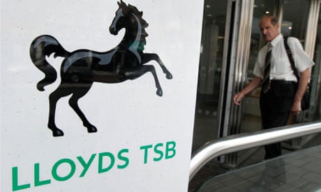 Customer entering a branch of a Lloyds TSB bank 