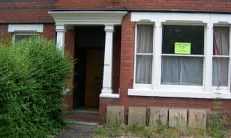 home with to-let sign