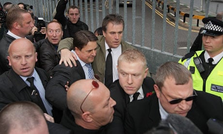Question Time protests: Nick Griffin arrives at BBC Television Centre surrounded by bodyguards