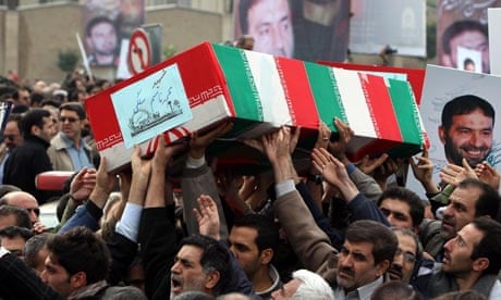 Iranians attend the funeral of revolutionary guards killed in an explosion near Tehran