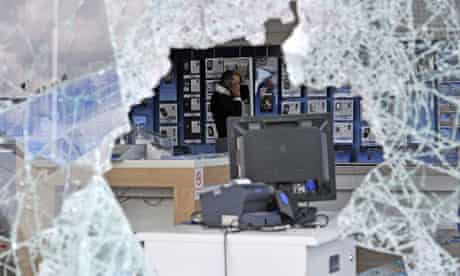 London riots: a looted O2 mobile phone store in Tottenham Hale retail park