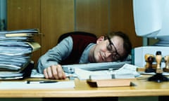 Man asleep at office desk