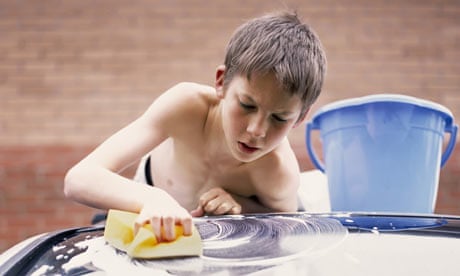 boy washing a car boy washing a car