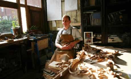 Hugh Wedderburn, wood carver, in his workshop