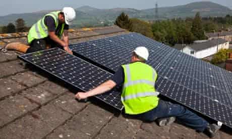 Fitting solar panels to a house roof in Wales