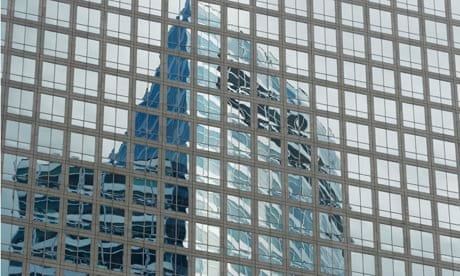 Goldman Sachs HQ is reflected in the windows of a neighboring building in New York