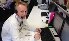 Gareth Power taking calls in the Speed-e-Loans office