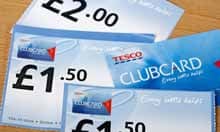A Tesco clubcard and vouchers