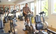 Man fitness training in sports club