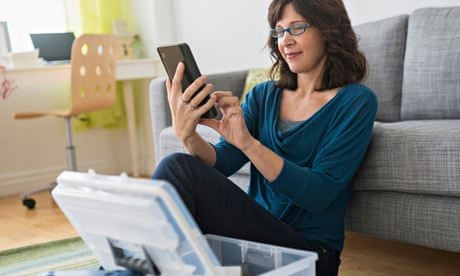 Woman using tablet pc at home 