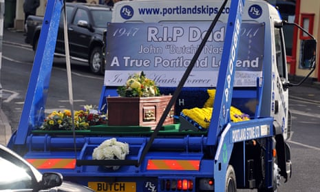 coffin on skip truck