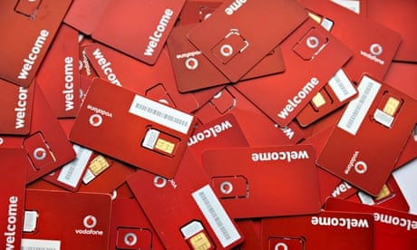 Pile of Vodafone  SIM cards