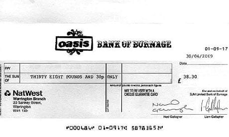 Oasis cheque signed by Noel and Liam Gallagher