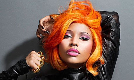 nicki minaj orange dress On the Scene at the 2023 VMA's: Nicki Minaj in Dolce & Gabbana, Yung Miami in Han Kjobenhavn, Cardi B in Dilara, Doja Cat in Monse + More