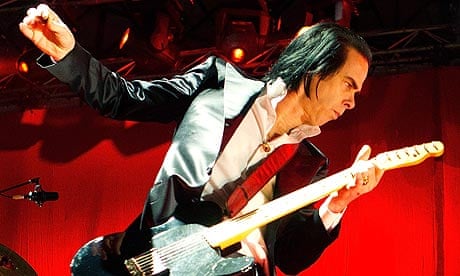 Nick Cave performs with Grinderman in 2011