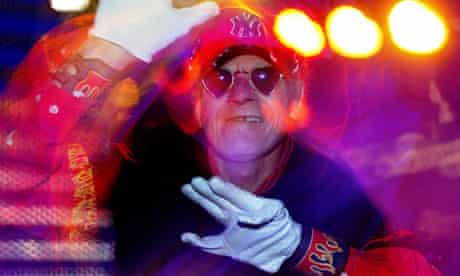 "Dancing Pete" Turner: aging man raving in NY baseball cap and heart-shaped sunglasses