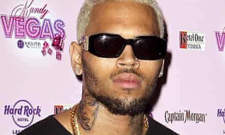 As tatuagem pena do chris brown Chris Brown Denies His New Tattoo Depicts A Beaten Rihanna Chris Brown The Guardian