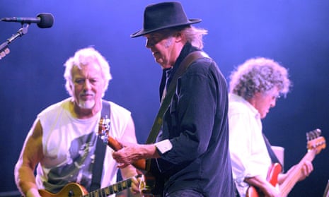 Neil Young, centre, onstage with Crazy Horse's Frank 'Poncho' Sampedro, left, and Billy Talbot in Ju
