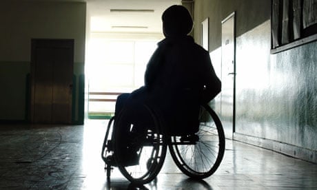 Silhouette of woman in wheelchair