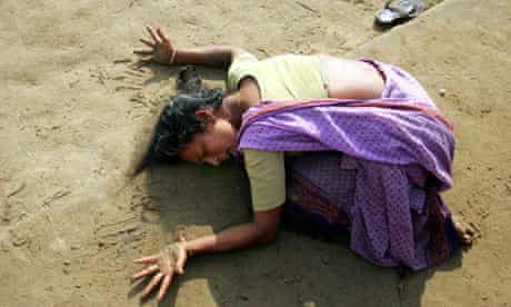 Indian woman mourns death of her relative killed in tsunami in Cuddalore