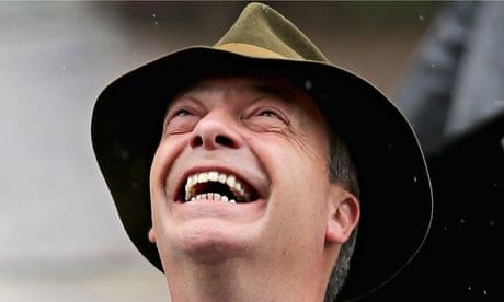 Nigel Farage laughs up at rain