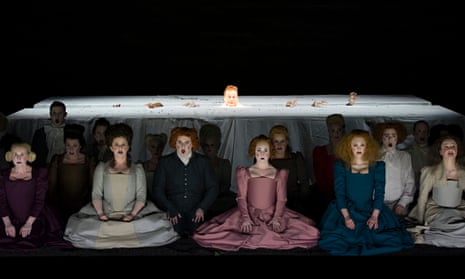 He’s behind you… the Glyndebourne Chorus with, centre back, Henry Waddington appearing in the middle of the table as Saul. Photograph: Richard Hubert Smith 