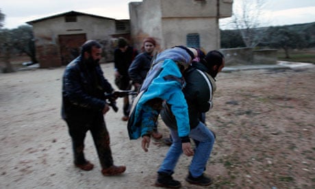 syrian-rebel-evacuates-wounded-comrade