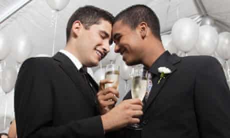 Gay married couple enjoying wedding reception