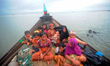 Rohingya Muslims trying to cross the Naf river into Bangladesh