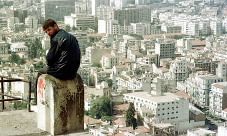 Algiers: a man sits overlooking the city