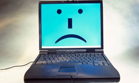laptop computer unhappy face