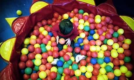 pre-school child in ball pool
