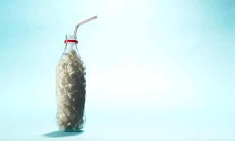 A soft drink bottle filled with sugar cubes