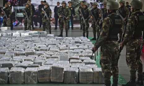 Police guard seized cocaine at Lima airport in Peru last September.