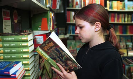 Reading girl in a bookstore