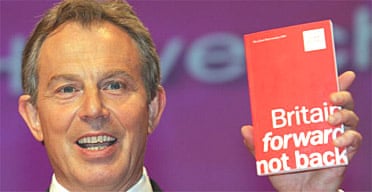 13.04.05: Tony Blair holds Labour's 2005 manifesto at its press launch