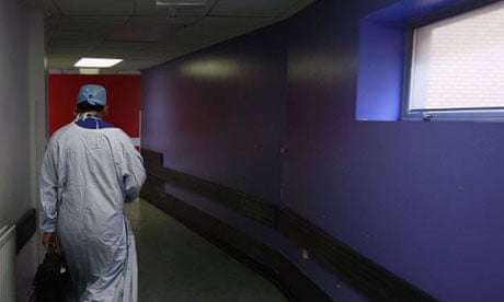 A surgeon makes his way home after working in theatre at the Queen Elizabeth hospital in Birmingham on June 14 2006. Photograph: Christopher Furlong/Getty Images