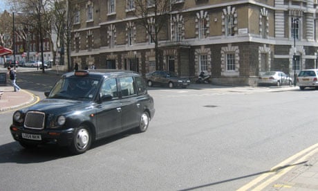 A black cab taxi in London. Photograph: Paul Owen