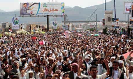 Anti-government protesters chant slogans during a rally in Sana'a