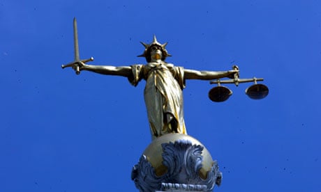 The statue of justice, clutching sword and scales