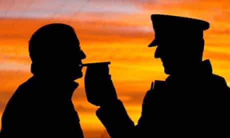 Man being breathalysed / alcohol / police / drink-driving