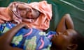 A mother with her 20 minute old baby, Uganda.