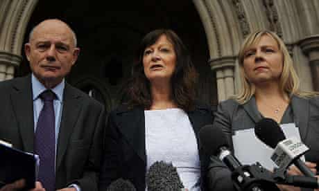 Sharon Shoesmith (C) addresses the media outside the Royal Courts of Justice on 27 May 2011