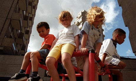 Children playing at open air nursery on housing estate in London.